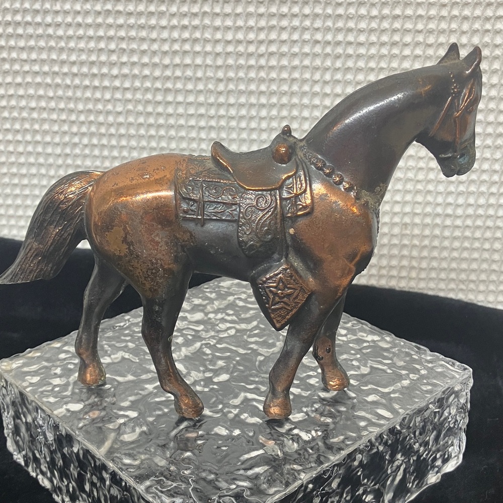 Copper metal horse figurine